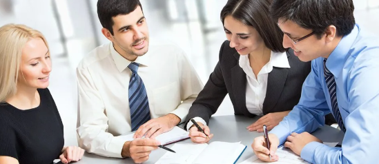 Professional business team collaborating at a meeting